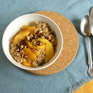 Bowl of Oatmeal with Peach Slices